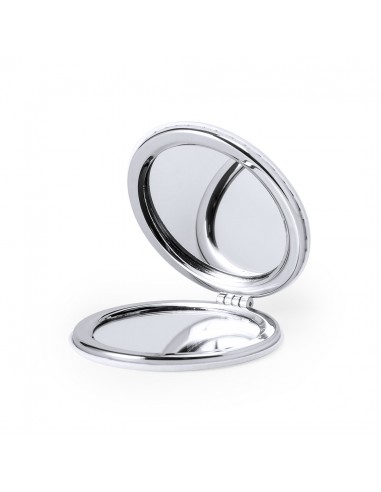 Espejos con dos aumentos en acabado de polipiel...