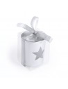 Velas en recipiente de cristal con una estrella